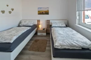 Ferienhaus Deichgraf in Dornumersiel Schlafzimmer 2